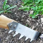Sarchiatore con denti metallici