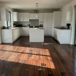 Pavimento laminato effetto legno scuro