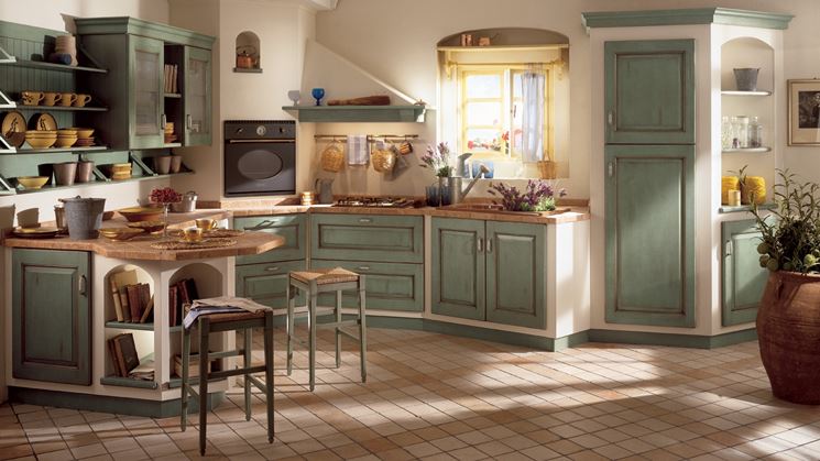 Cucina rustica in muratura con intonaco e inserti in legno